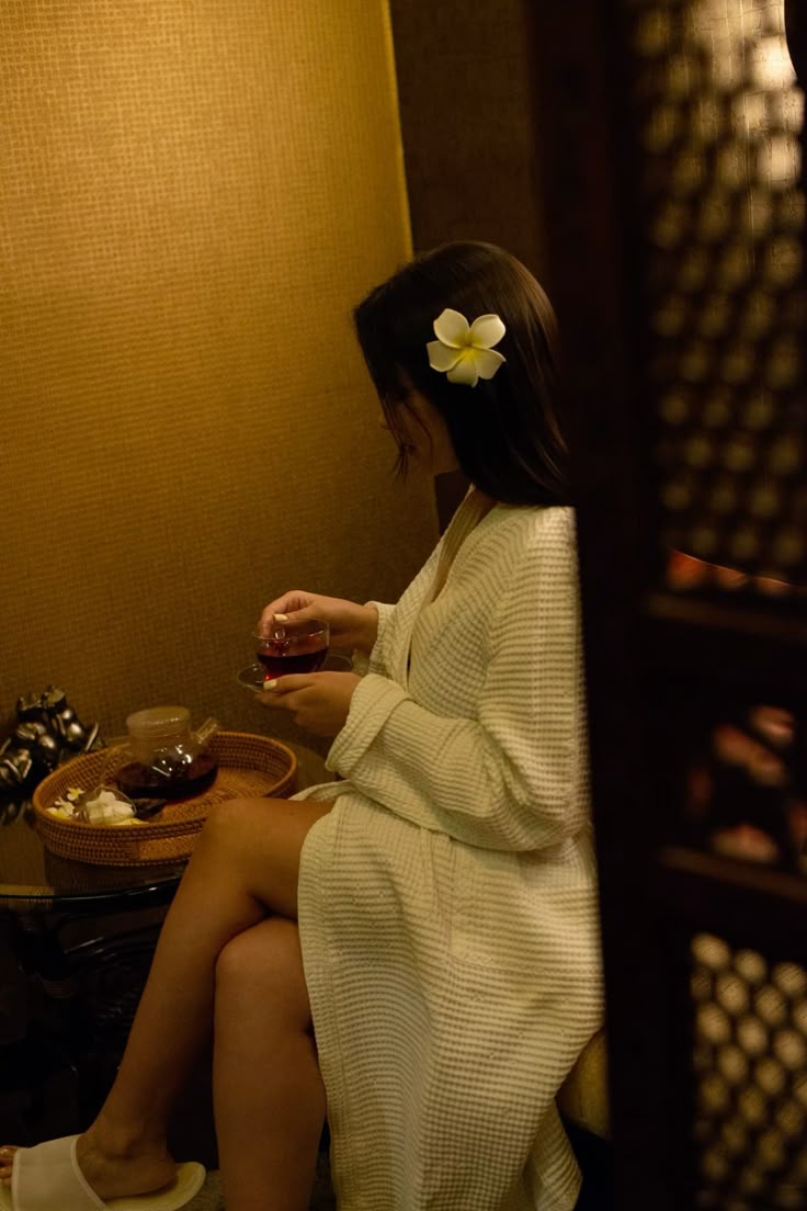 Relaxation Massage setting with candles and flowers
